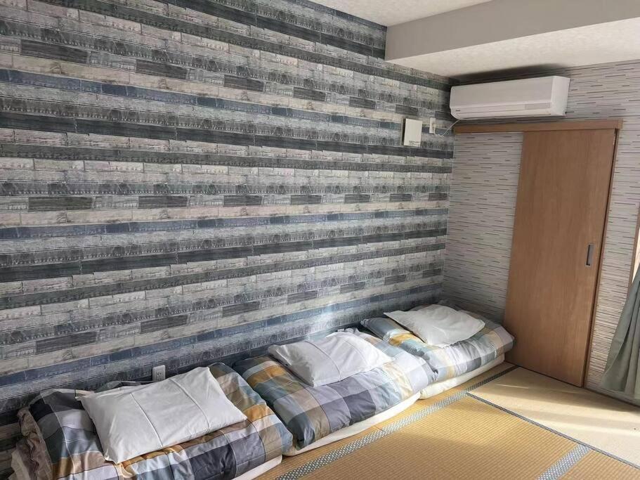 Apartamento 全新上线花跡民宿4号馆303 萩之茶屋站一分钟！难波，心斋桥4分钟车程！通天阁，天王寺步行圈！ Osaka